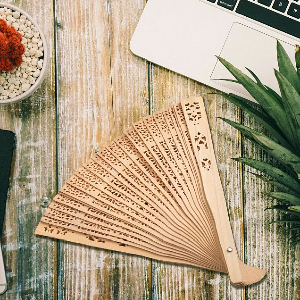 Intricately Carved Sandalwood Fan Favors